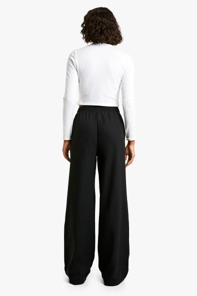 Високий брюк для ніг