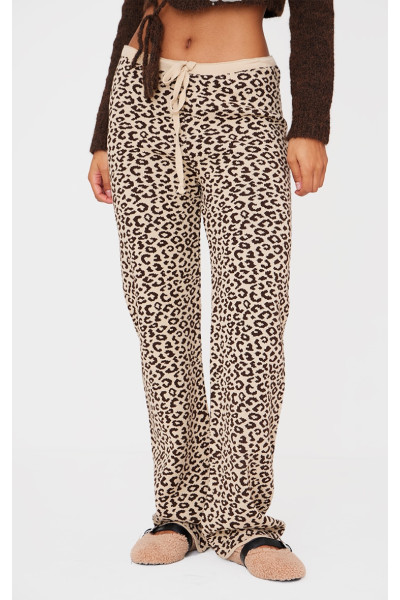 Коричневі широкі трикотажні штани з леопардовим принтом