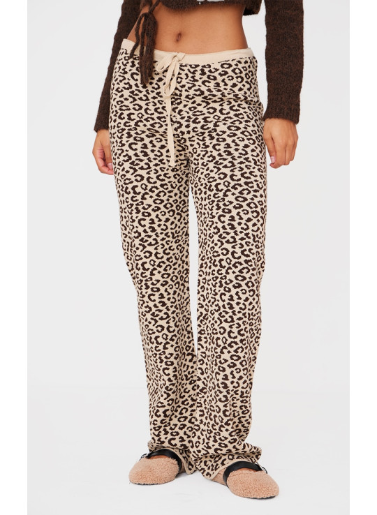 Коричневі широкі трикотажні штани з леопардовим принтом