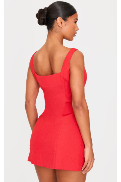 Червона плетена міні-сукня з високим горлом і бантом