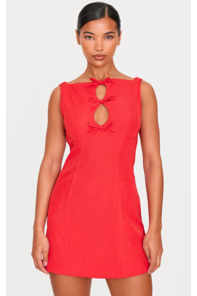 Червона плетена міні-сукня з високим горлом і бантом