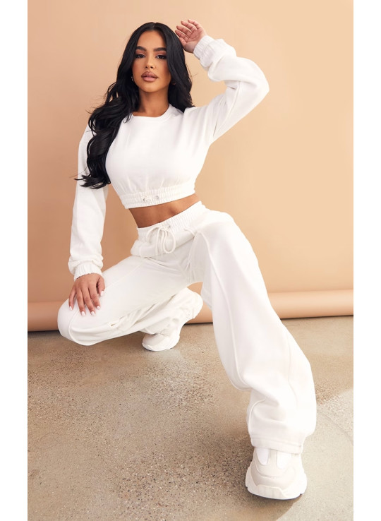 Маленькі кремові деталі шва широкі пробіжки для ніг